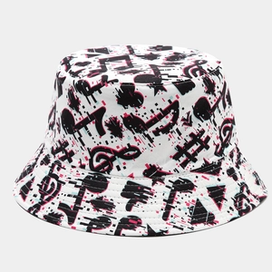 White bucket hat featuring glitch style musical note print and casual cotton design