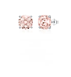 Detail of S925 sterling silver earrings with rose cut pink stones and classic four-prong setting