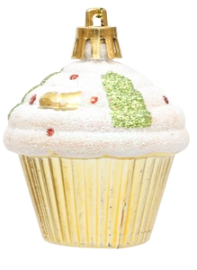 Macro detail of cupcake-shaped Christmas ornament with gold base and glittery tree