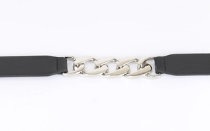 Detail of black leather belt featuring decorative silver metal chains in punk style