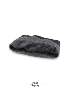 Detail of winter neck warmer featuring soft grey fleece lining and cable knit texture