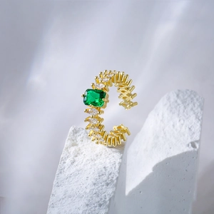 Adjustable gold plated geometric ring with green zircon and white crystal accents