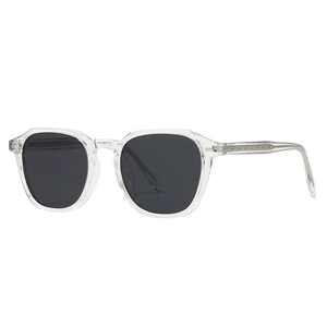 Classic round polarized sunglasses with transparent frames and carved metal inner temples