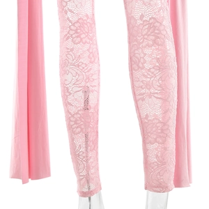 Detail shot of pink floral lace pants with sheer fabric and elegant side drapes