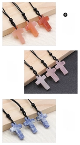 Detailed comparison of red agate, rose quartz, and blue stone cross pendants on cords