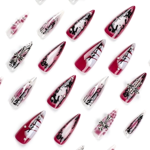 Gothic stiletto press-on nails with dark red gradient ink and silver cross charms