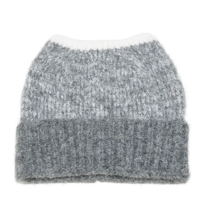 Detail of grey and white knit cat ear beanie with textured mohair blend fabric