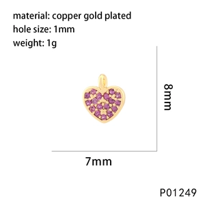 Detailed view of heart-shaped gold-plated copper pendant with pink gemstone and dimensions