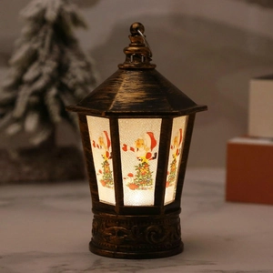 Detail of vintage bronze Christmas lantern featuring Santa patterns and warm LED light glow
