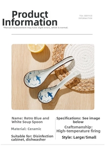 Detail of vintage blue ceramic soup spoon with fish pattern on a rustic wooden table