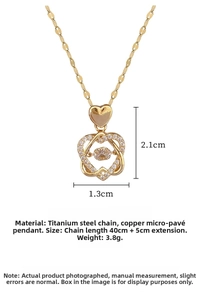 Detail view of gold heart necklace with dancing stone and titanium steel chain specs
