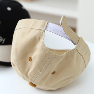 Khaki baby baseball cap featuring bear embroidery and adjustable velcro strap back