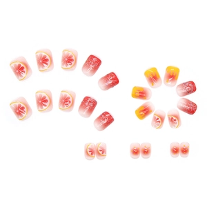 Short press-on nails set with lemon and grapefruit fruit patterns and glitter finish