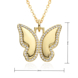 Detail view of a gold butterfly pendant with white crystals measuring 18mm by 20mm