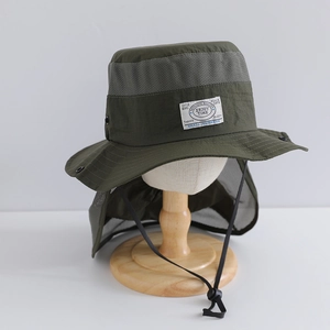 Detail of green mesh breathable fishing hat with long neck flap and windproof chin cord