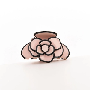 Elegant camellia flower hair claw clip in light pink and black for French style updos