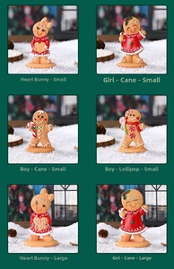 Detail view of assorted resin gingerbread man and bunny figurines for Christmas decor