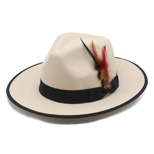 Classic beige wool jazz fedora hat with black ribbon and tricolor feather decoration