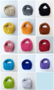 Macro shot of 14 candy-colored plush chenille mini bags showing soft microfiber texture