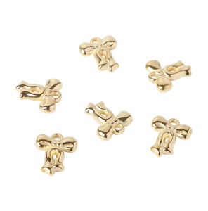 Detailed close-up of six gold metallic bow pendants for DIY jewelry crafting on white background
