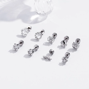Lot de 9 boucles d'oreilles en acier inoxydable argenté, motifs fleurs et étoiles