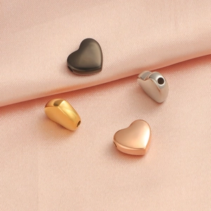 Polished stainless steel heart-shaped charm beads in gold, silver, rose gold, and black colors