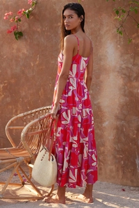 Detail view of pink and red floral tiered skirt with lightweight fabric and summer print