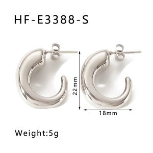 Close-up of silver C-shaped hollow hoop earrings with polished finish, 22mm x 18mm size