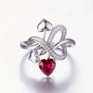 Fashionable silver heart ring with red gemstone and infinity symbol with white zircon