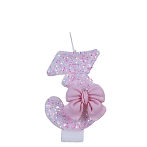 Pink glitter number 3 birthday candle with a cute bow decoration on white background