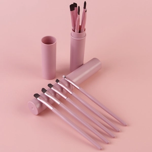 Pink 8-piece makeup brush set with storage tube for eyeshadow and blending