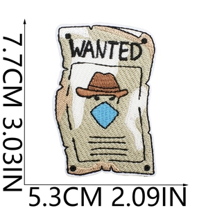 Detail of Cowboy Wanted embroidered patch with precise size measurements in inches and cm