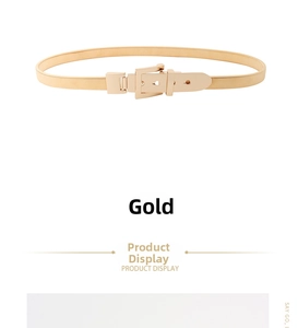 Close-up of polished gold metal spring waist chain featuring a square buckle design
