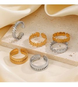 Set of six adjustable open rings with fishbone and geometric patterns in gold and silver