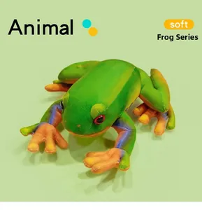 Detail of soft green plush frog with purple patterns and bright orange feet