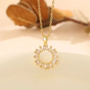 Elegant gold sunflower pendant necklace with zircons on a delicate chain jewelry