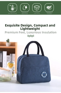 Detail of navy blue insulated lunch bag with panda logo and sturdy black carry handles