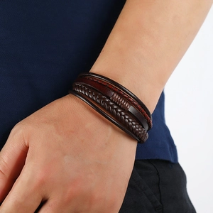 Handmade multilayer braided leather bracelet for men in brown featuring a retro aesthetic