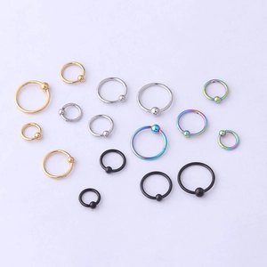 Detail showing various sizes and colors of stainless steel seamless piercing rings