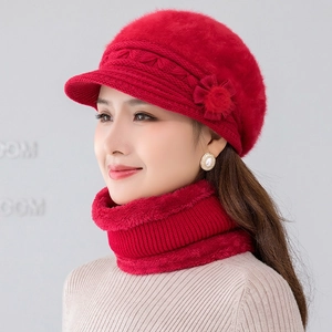 Women's red winter knit hat and scarf set with flower detail and plush fur lining