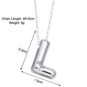 Macro shot of silver tubular letter L pendant with dimensions 2.2cm and 45cm chain