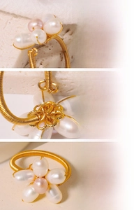 Detail of handmade freshwater pearl ring with 18K gold plated wire wrapping
