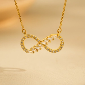 Golden infinity heart necklace for women featuring sparkling cubic zirconia stones