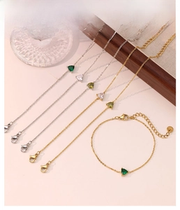 Detailed view of adjustable triangle zircon bracelets in gold and silver finishes
