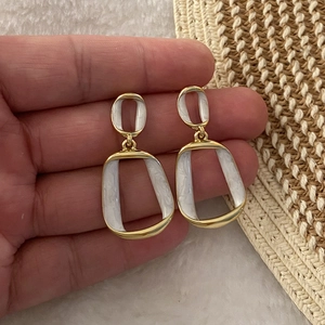 French retro gold geometric dangle earrings with white marble texture enamel details