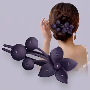 Elegant purple flower hair claw with matte finish and sparkling rhinestones for women