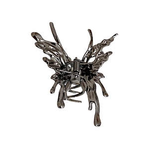 Polished silver butterfly hair claw clip with liquid metal design for a modern hair style
