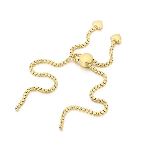 Golden metal box chain bracelet with adjustable slide clasp and heart-shaped pendants