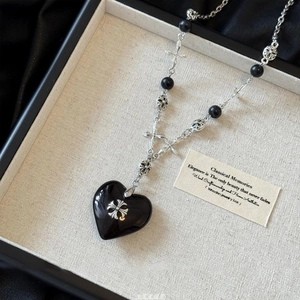 Classic heart pendant necklace with black stone beads and silver cross motifs