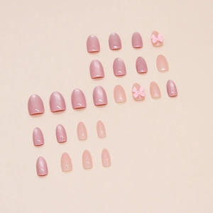 Set di unghie finte rosa con fiocchi 3D e finitura perlata scintillante per donne
